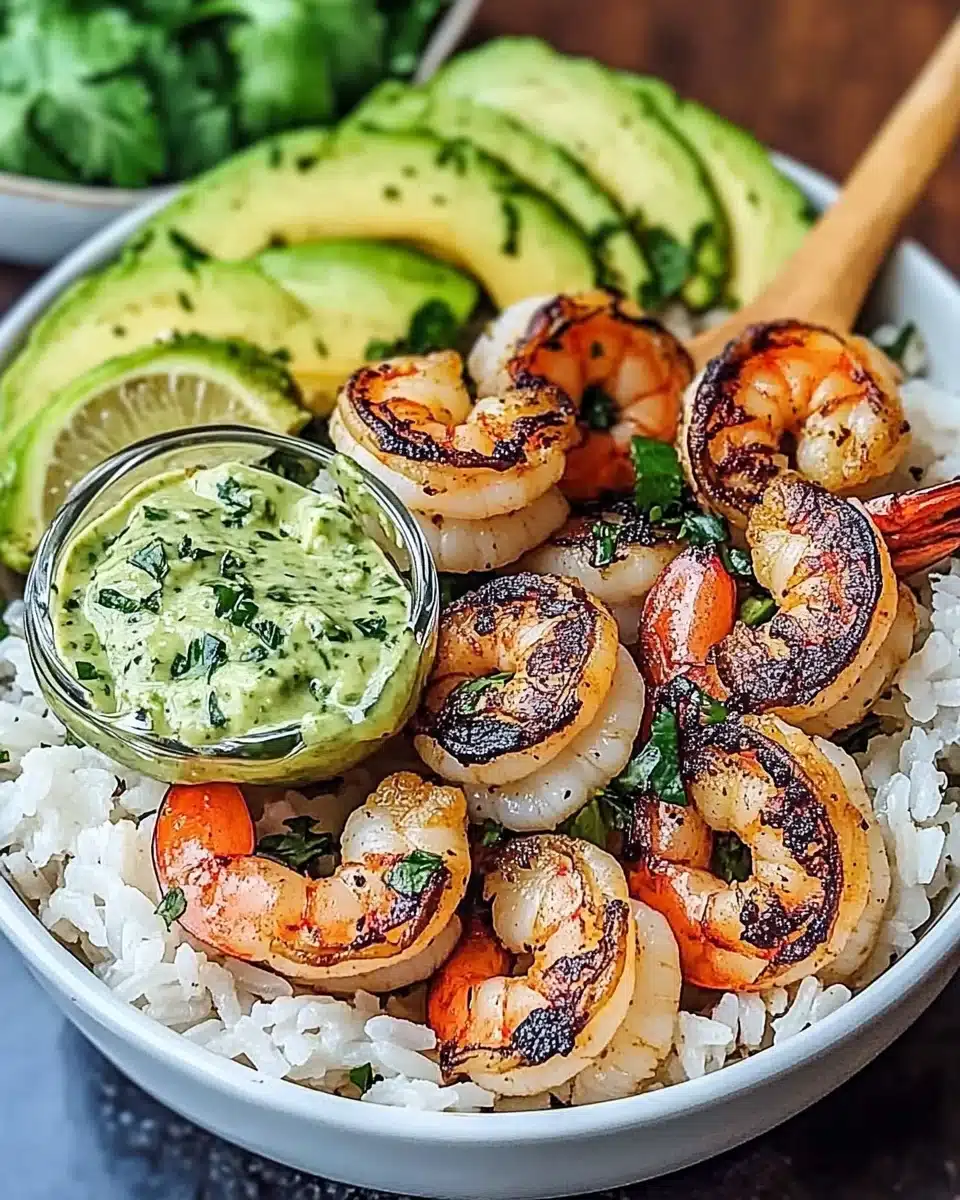 Zesty Shrimp Avocado Rice Bowls with Cilantro Lime Sauce await your taste buds!