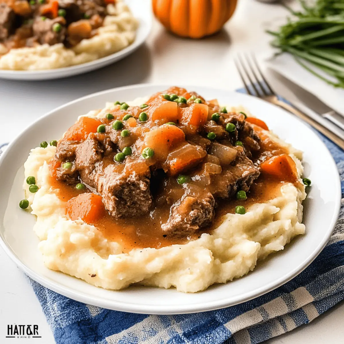 Savory Apple Cider Beef Stew over Creamy Mashed Potatoes